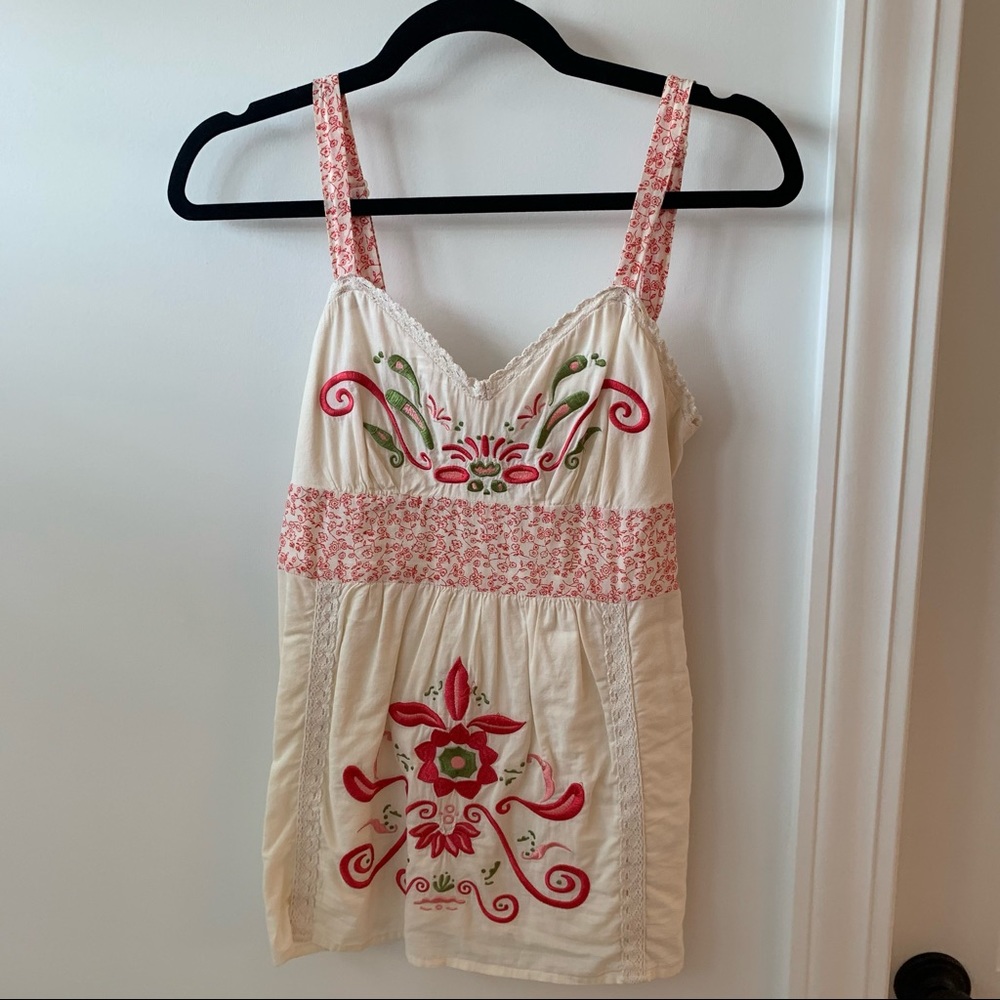 Small top with embroidery detail